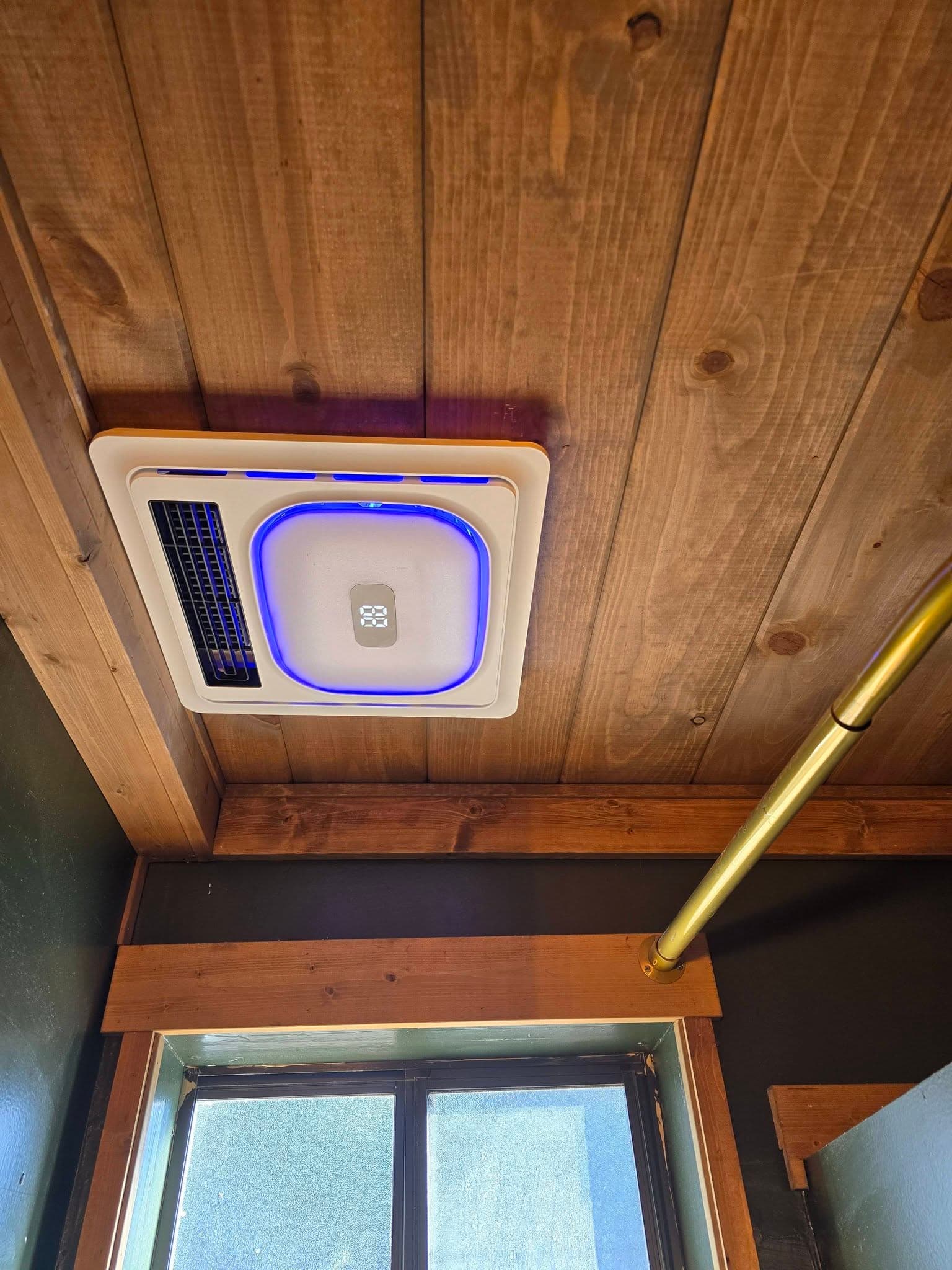Bathroom exhaust fan with light